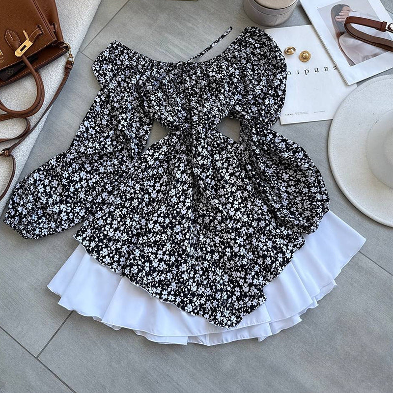 Damebluse med rynket ærme og blomsterdesign Stilla