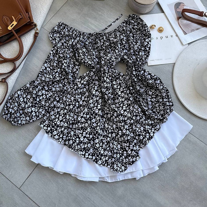 Damebluse med rynket ærme og blomsterdesign Stilla
