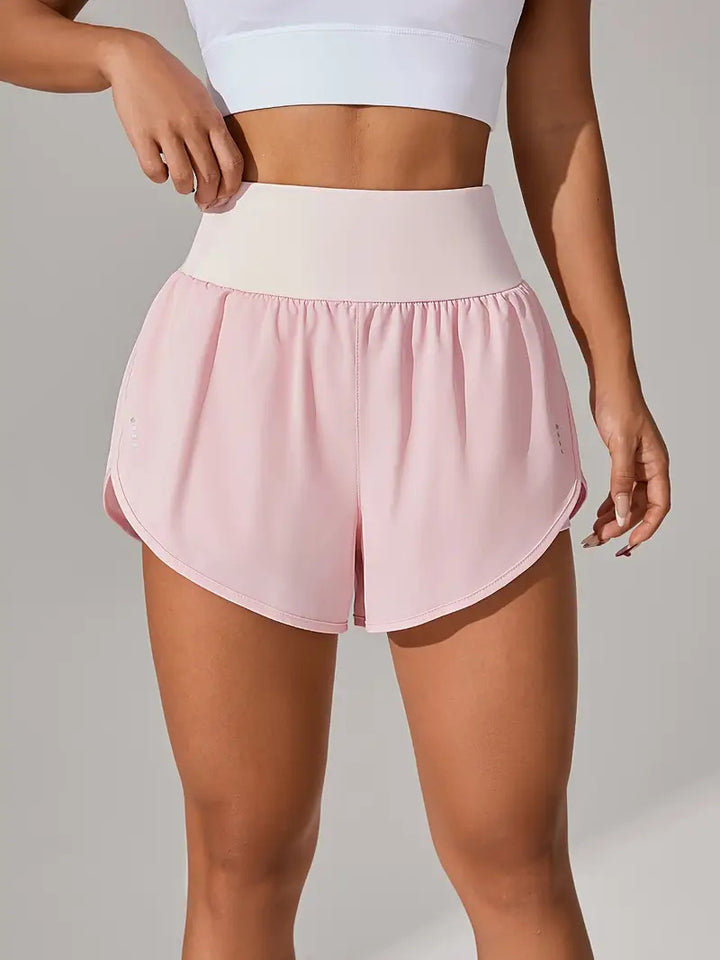 Dame Sporty Løbe shorts med strækbart liv og åndbare mesh-indsæt Stilla