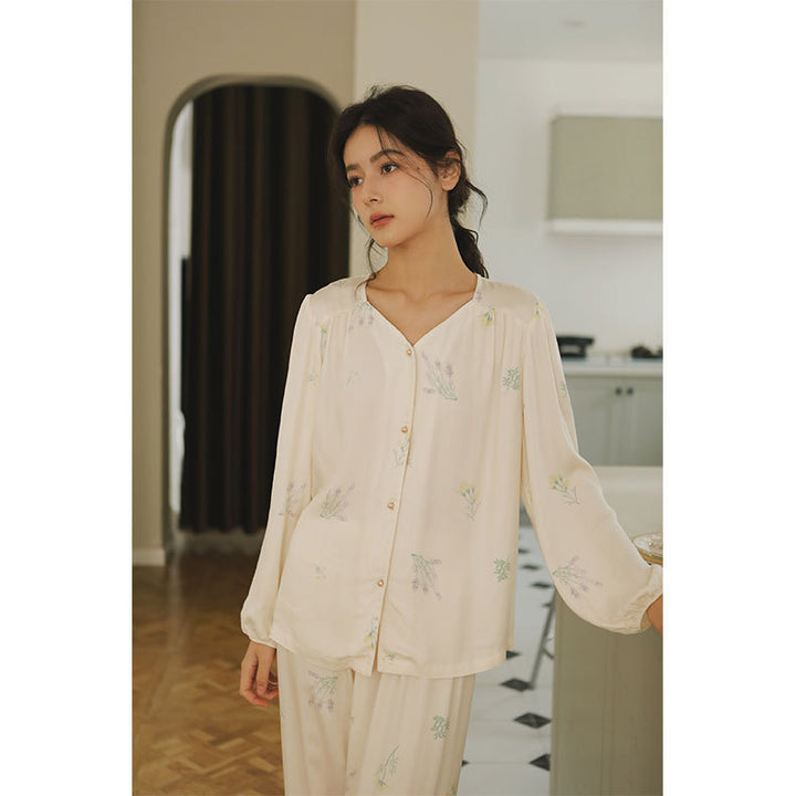Dame åndbar pyjamas-sæt med blomstret design og elegant knapliste Stilla