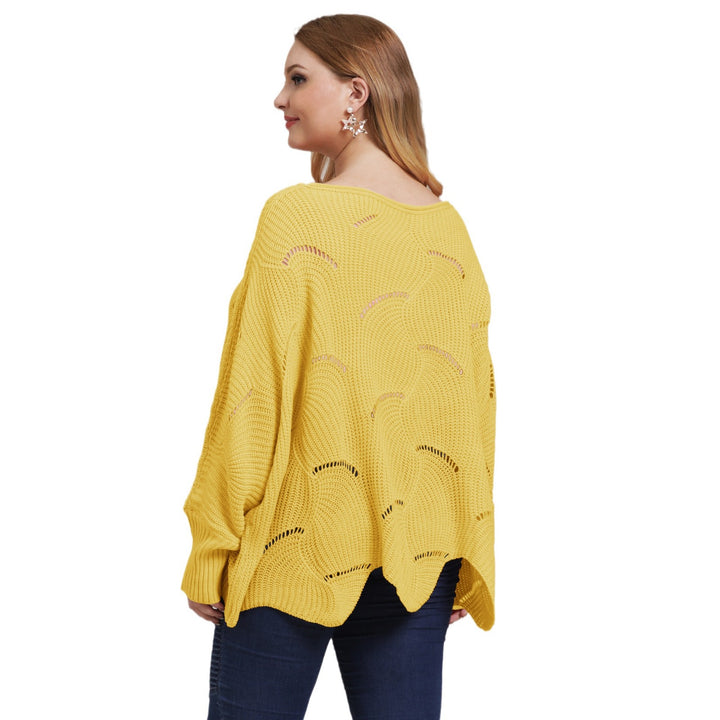 Dame luftig grovstrikket sweater med moderne hulmønster Stilla