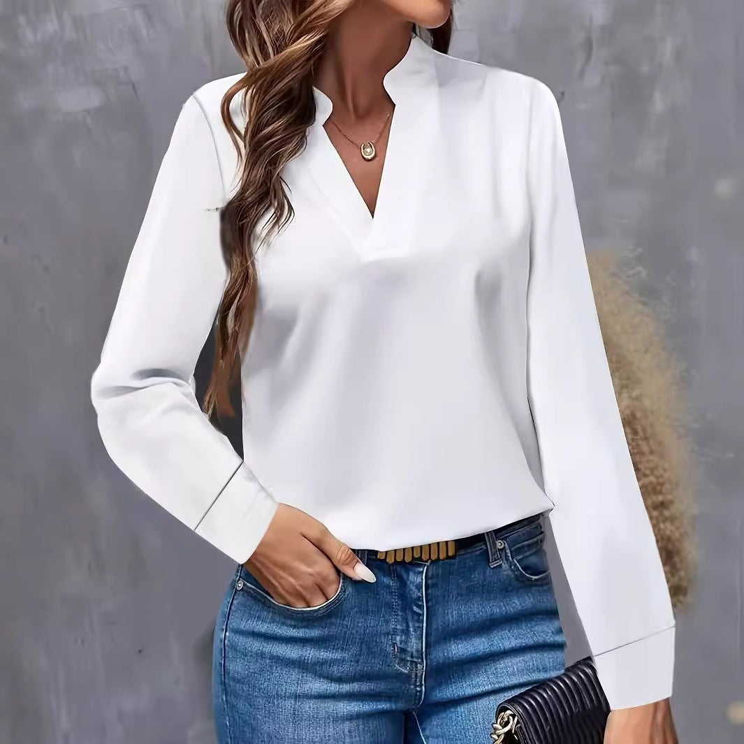 Damebluse med moderne V-halsudskæring og elegante lange ærmer Stilla