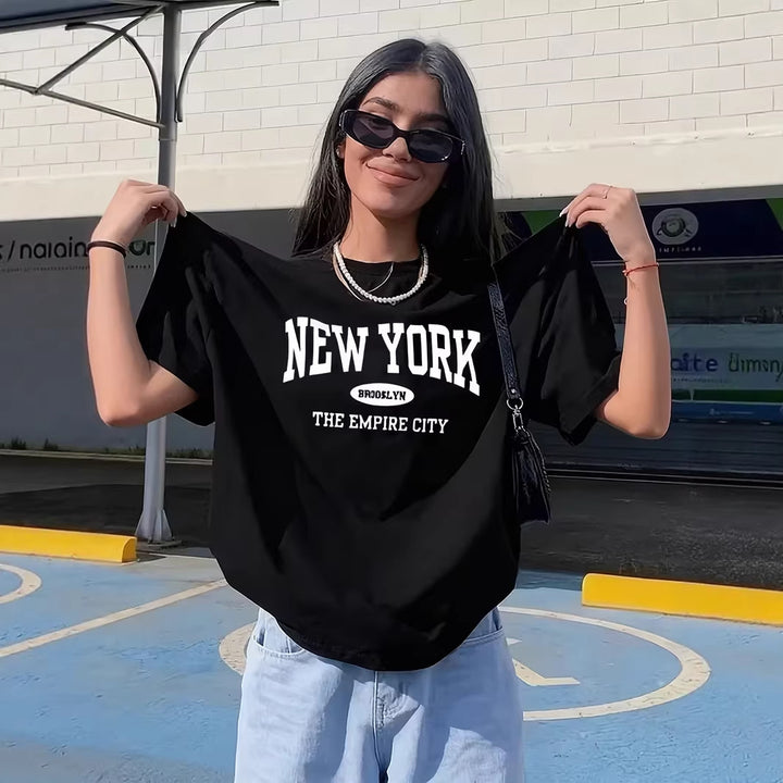 Dame afslappet oversized T-shirt med New York tekst Skovae