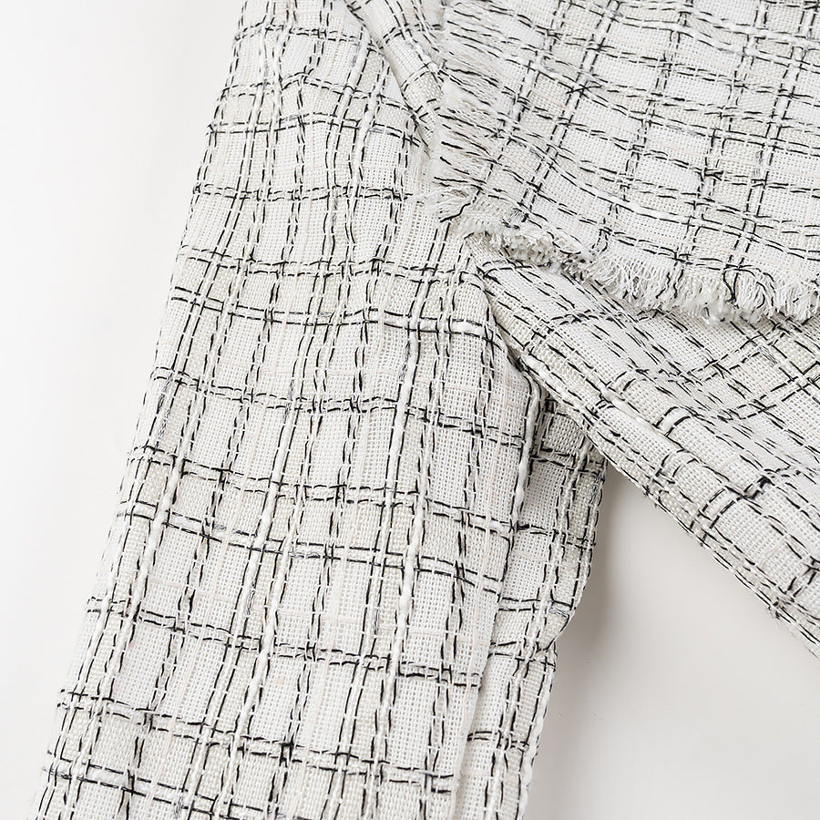 Dame blazerjakke i elegant tweed-design med figursyet snit og praktiske lommer Stilla