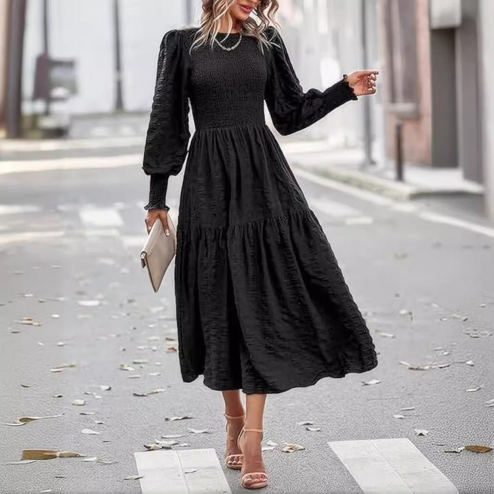 Dame Flydende Maxikjole med struktureret Skørt og elegante Puffærmer Stilla