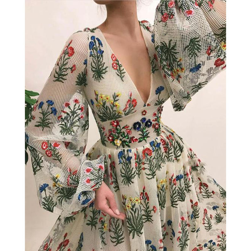 Dame maxikjole med blomsterprint og svajende ærmer Stilla