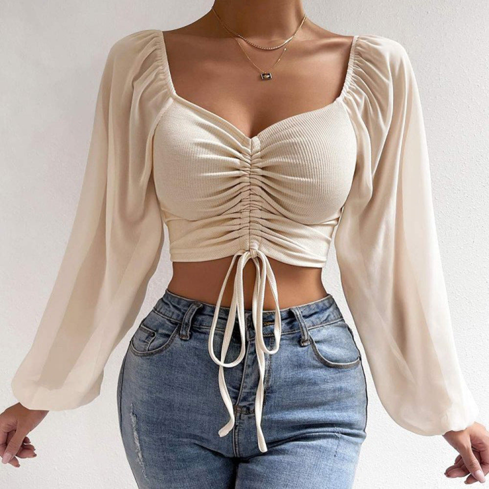 Damebluse med rynket design og ballonformede ærmer Stilla