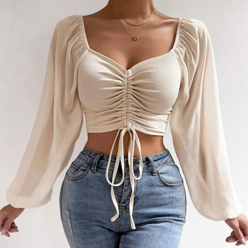 Damebluse med rynket design og ballonformede ærmer Stilla