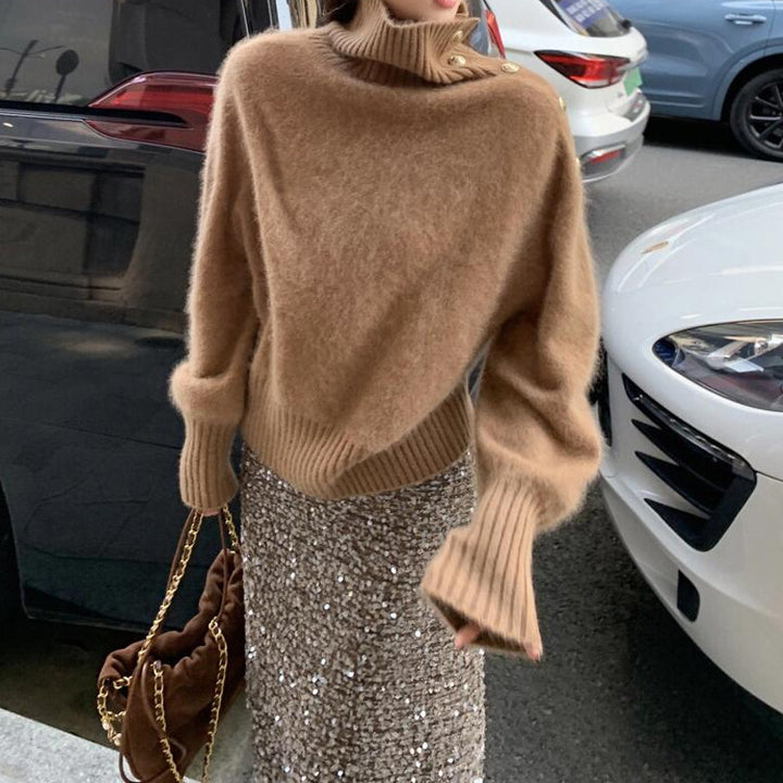 Kvinderens fashionable sweater med stilfuld turtle neck og fin ribbeting struktur Stilla