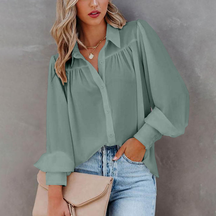 Dame elegant bluse med voluminøse ærmer og fine folder Stilla