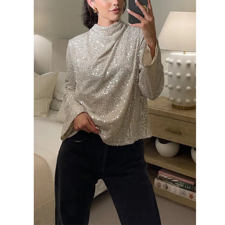 Dame skinnende pailletbluse med bred pasform Stilla