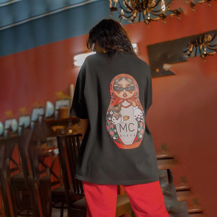 Kvindernes kreative oversized T-shirt med funky grafisk print Stilla