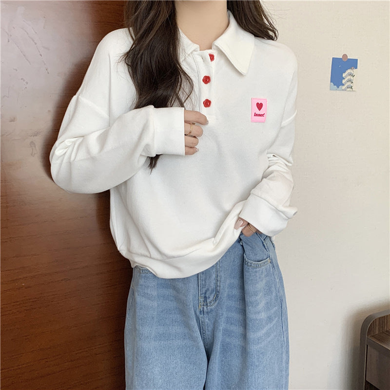Femme Relaxed Fit Polo-Style Sweatshirt med Hjerteemblem Stilla