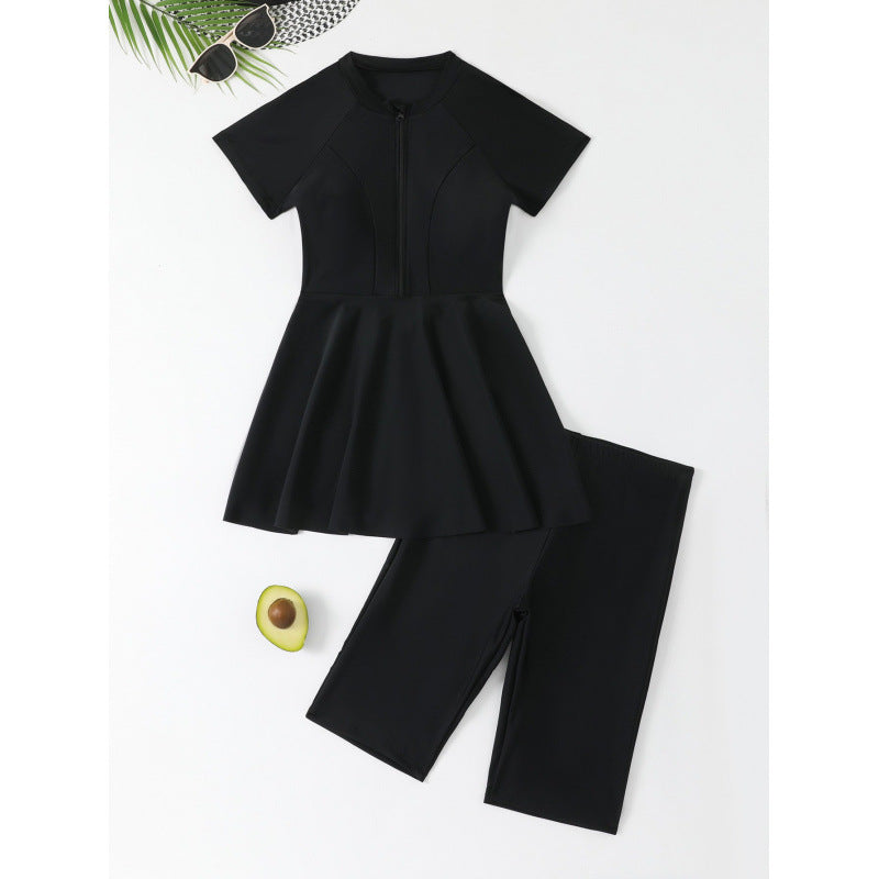 Dame badedragt med peplum design og praktisk lynlås Stilla
