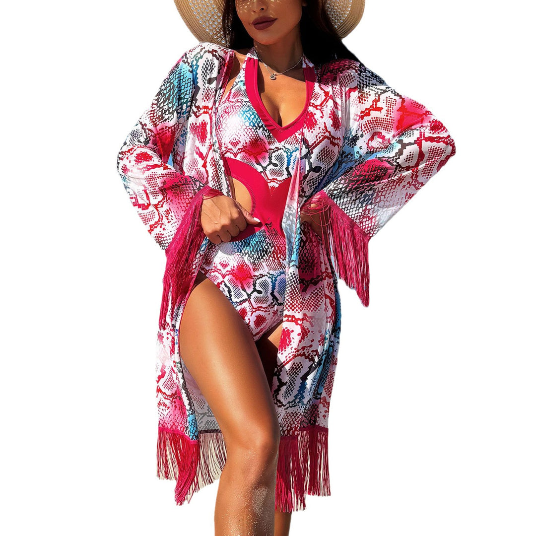 Dame badedragt med elegant cut-out og frynsede cover-up Stilla