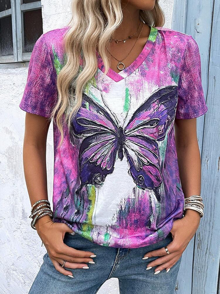 Dame V-hals T-shirt med kunstnerisk sommerfugletryk og afslappet pasform Stilla