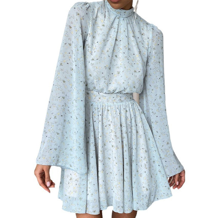 Damekjole med voluminøse ærmer og elegant drapering Stilla