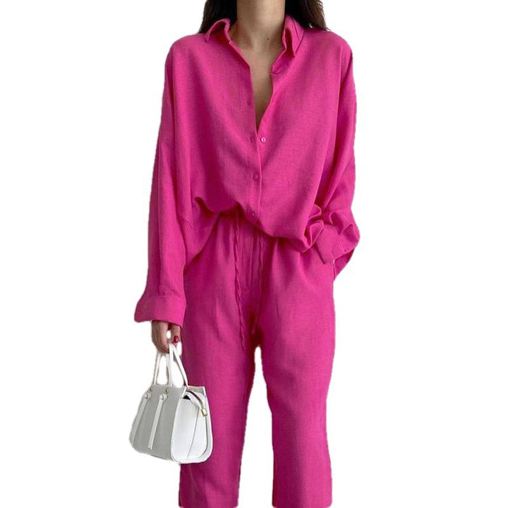 Dame Casual Linnekostume med løs pasform og elegant knaplukning Stilla