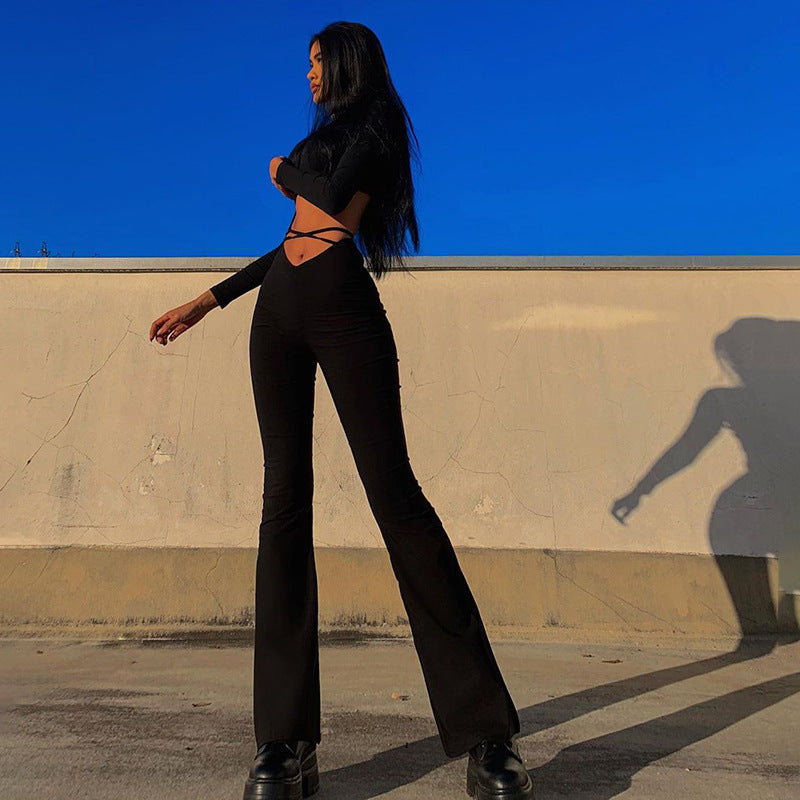Dame flare jumpsuit med åben rygudskæring og moderne bandeau Stilla