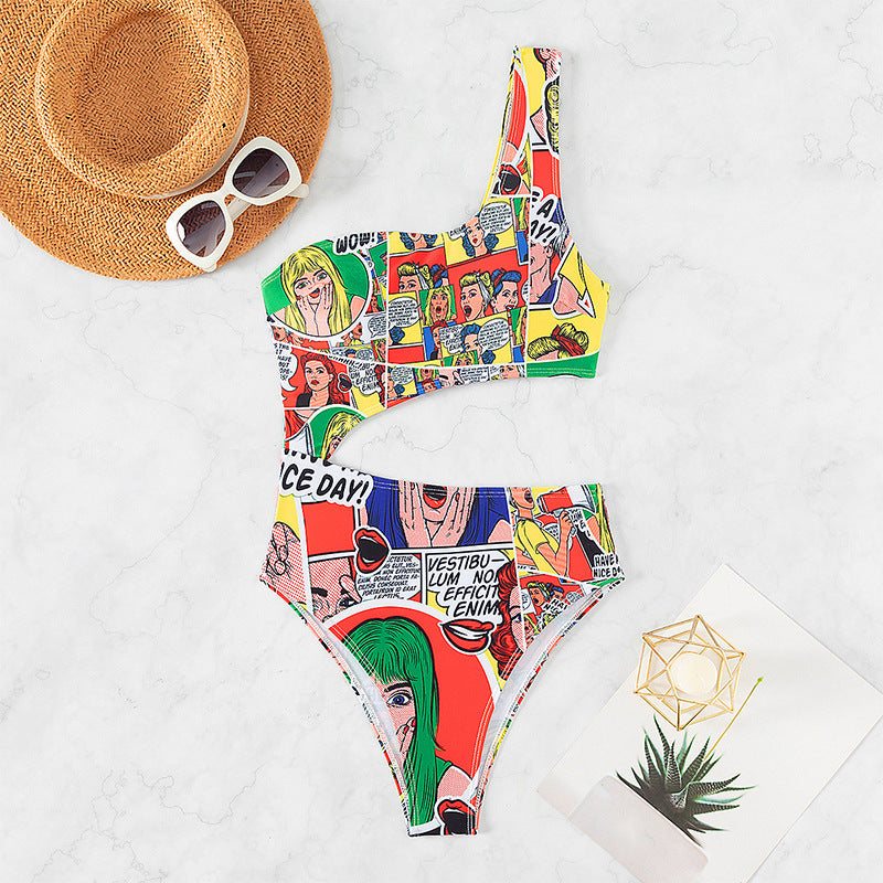 Dame badesuit med asymmetrisk snit og farverig comic-print Stilla