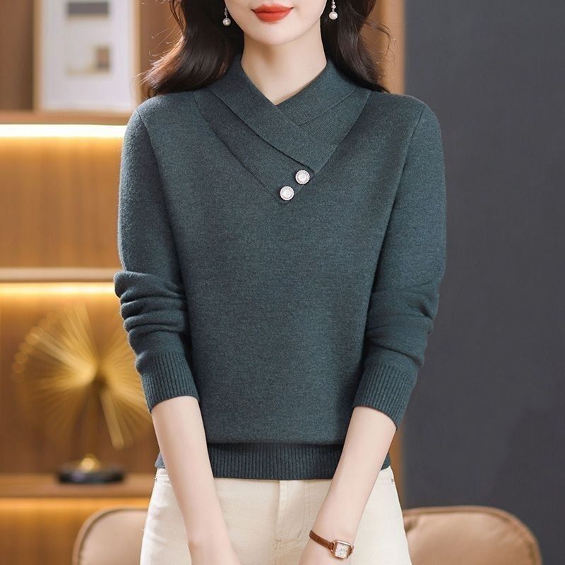 Dames elegant strikket pullover med chic V-hals og dekorative knapdetaljer Stilla