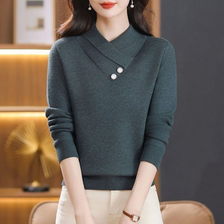 Dames elegant strikket pullover med chic V-hals og dekorative knapdetaljer Stilla