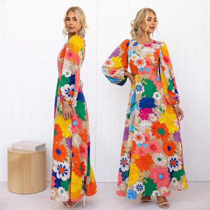 Kvinders blomster maxi kjole med voluminøse ærmer og blomsterprint over det hele Skovae