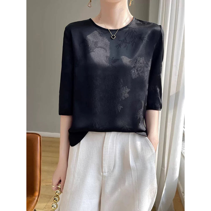 Damebluse med elegant broderi og fin struktur Stilla