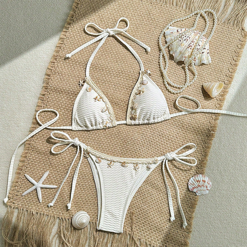 Dame triangel-bikini med sarte florale accenter Skovae