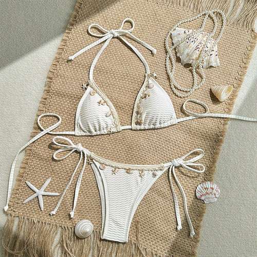 Dame triangel-bikini med sarte florale accenter Skovae