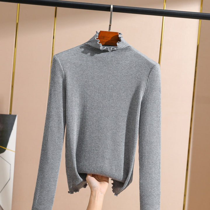 Dame rullekrave sweater med fin ribstruktur og elegante afslutninger Stilla