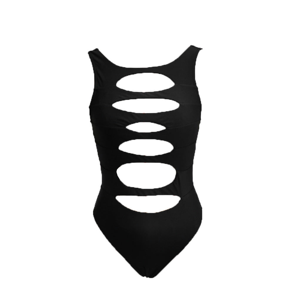Dame badedragt med spændende cut-out-design og slank pasform Stilla