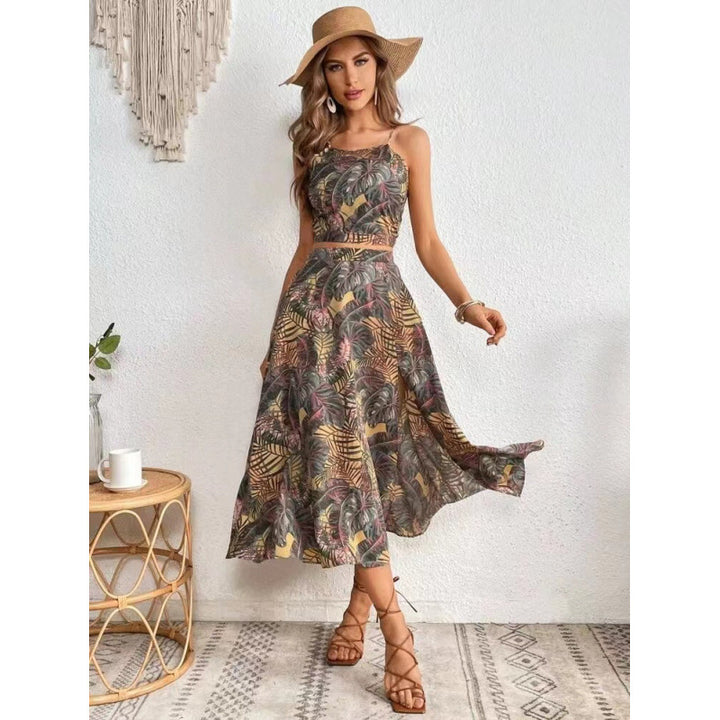 Dame maxikjole med floral twist og sidelængde Skovae