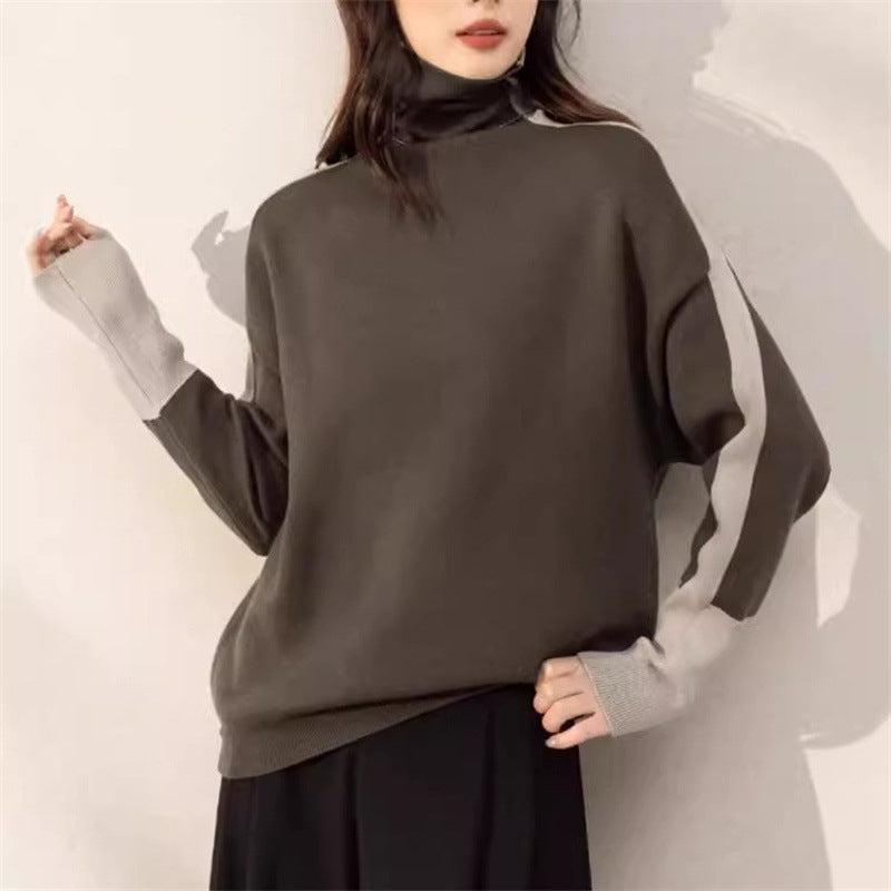 Kvinders oversized sweater med moderne turtleneck og kontrasterende ærme accenter Stilla