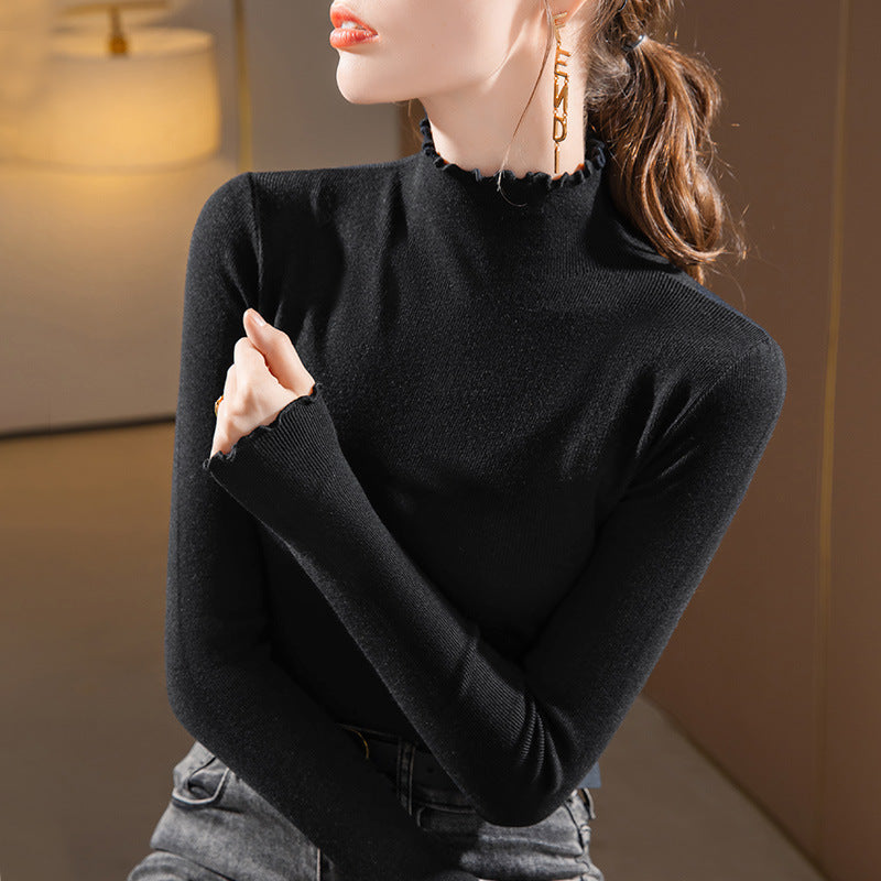 Dame Turtleneck top med elegante flæsedetaljer og fin struktur Stilla