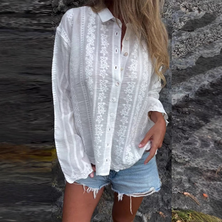 Kvindernes bluse med blomsterbroderi og tekstureret stof Stilla