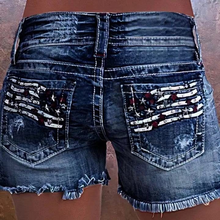 Dame Trendy Jeansshorts med frynset detaljer og patriotiske motiver Stilla