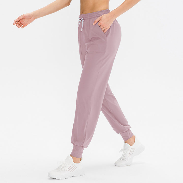 Dame Sporty Joggingbukser med praktiske lynlåslommer og fleksibel talje Stilla