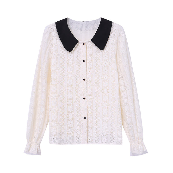 Kvinder elegant bluse med blondekrave og dekorative knapdetaljer Stilla
