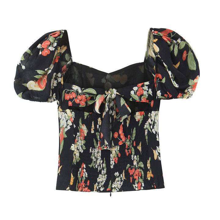 Dame Blusenshirt med luftige pufærmer og blomsterdesign Stilla