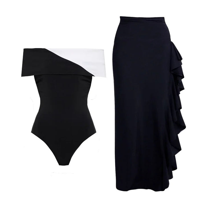 Dame badedragt med moderne off-shoulder design og elegant ruffles maxiskirt Skovae