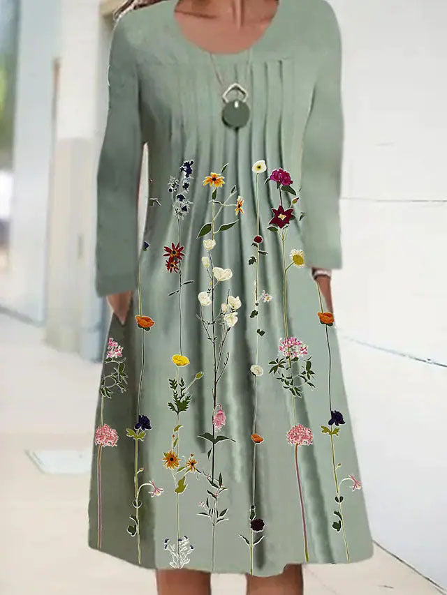Dame fritidskjole med blomstret design og lommer Stilla