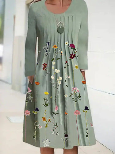 Dame fritidskjole med blomstret design og lommer Stilla