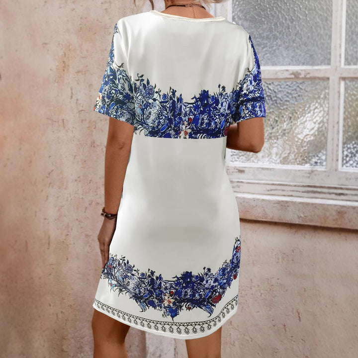 Dame skjortekjole med blomstret design og V-udskæring Stilla