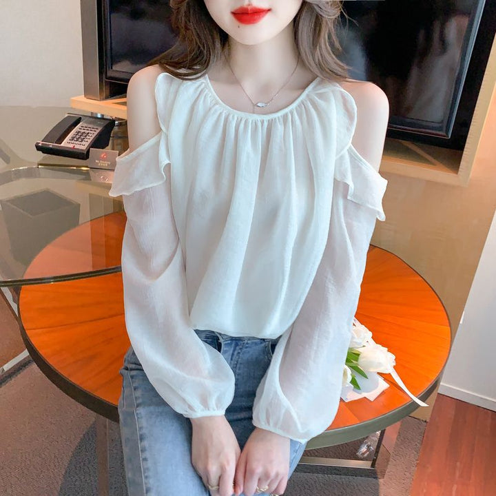 Kvinders bluse med off-shoulder design og flæse detaljer Stilla