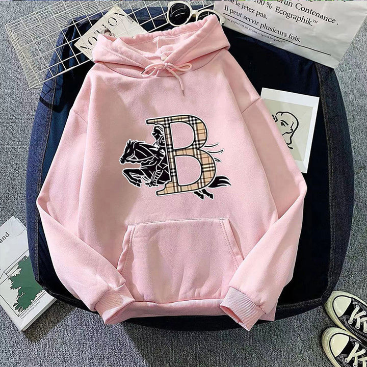 Dame hoodie med et stilfuldt hestemotiv og luksuriøs skrifttype Skovae