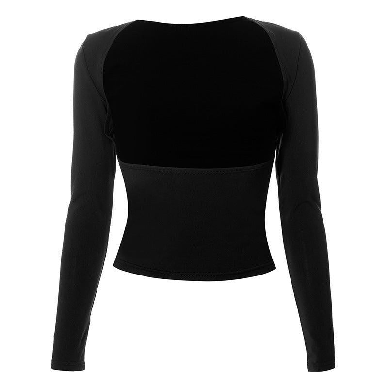 Dame figursyet longsleeve-top med åben ryg og elegant design Skovae