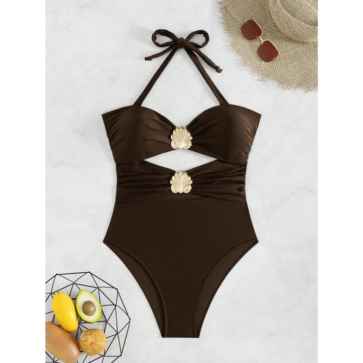 Damer Enstykke badedragt med elegant cut-out og dekorativ musling-applikation Stilla