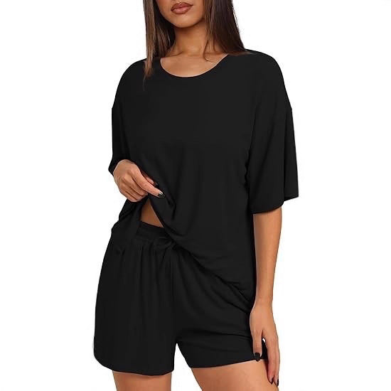Dame Oversize T-shirt med afslappet snit og sidelange sprækker Skovae
