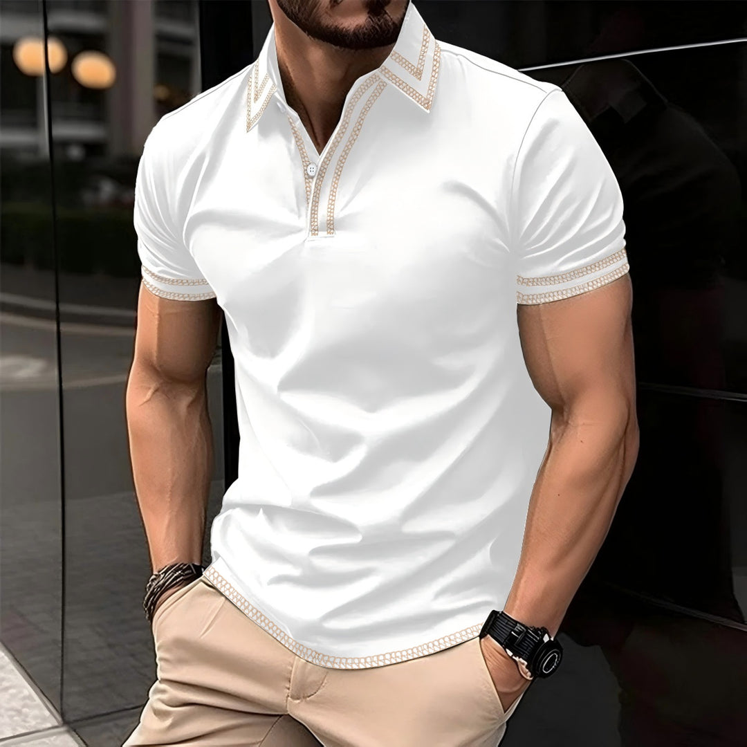 Stilfuld herre-polo med trendy broderidetaljer Stilla